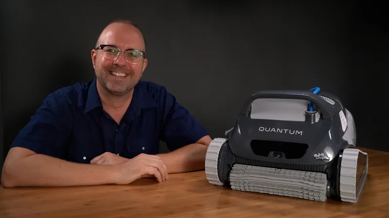 Justin from The Pool Nerd with a robotic pool cleaner