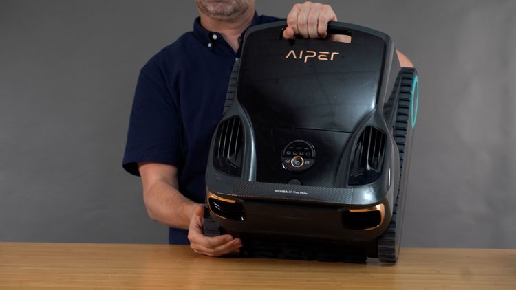 Lifting the heavy Aiper Scuba X1 Pro Max out of the pool — a daily workout