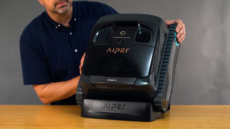 To charge the Aiper Scuba X1, you place it on this included charging stand