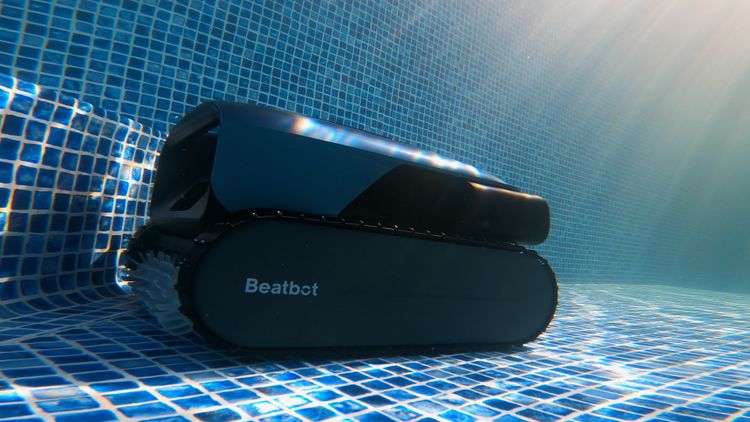 Close-up of the robot working on the pool floor