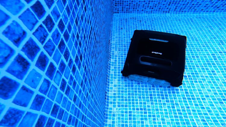 View of the robot cleaning inside the pool wall