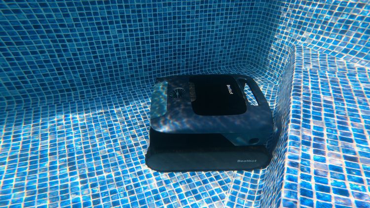 The AquaSense 2 Pro navigating pool stairs
