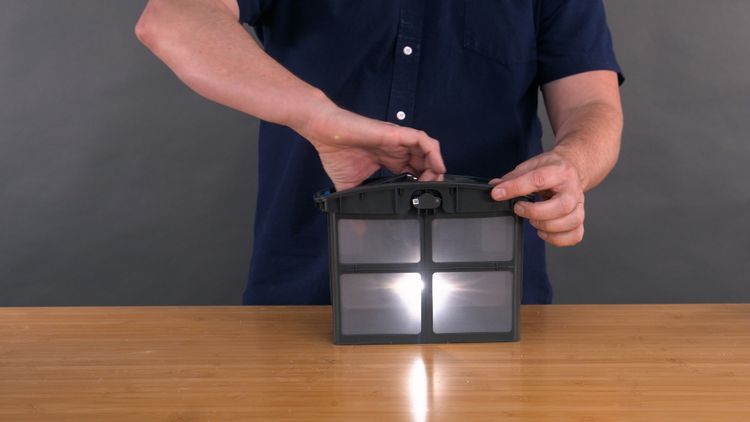 AquaSense 2's single filter basket — basic mesh filtration