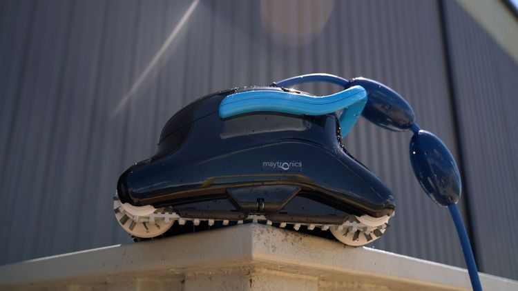 The Dolphin Nautilus CC Plus drying off after a cleaning cycle in our test pool