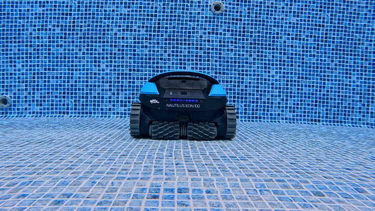 The EON 100 submerged with its blue indicator lights illuminated