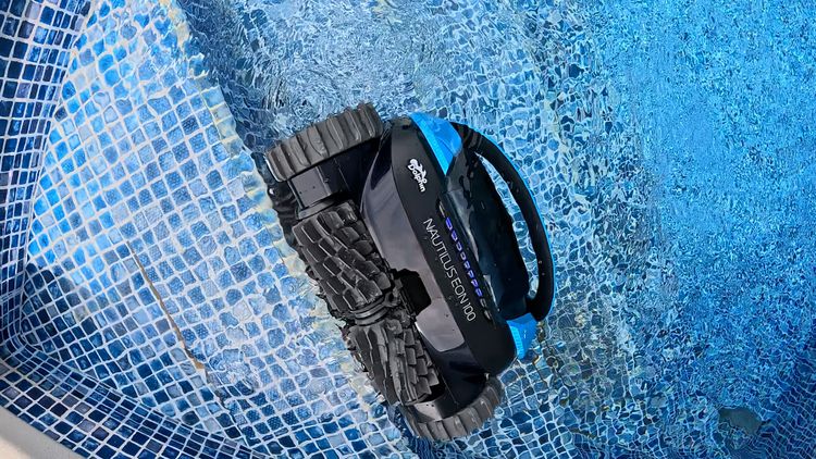 Top-down view of the Nautilus EON 100 tracks beside a pool step