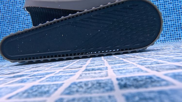 A closeup of the rubber track tread