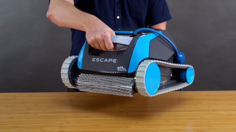 Holding the Dolphin Escape robotic pool cleaner
