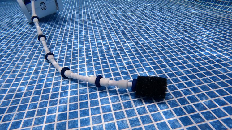 Most pressure-side cleaners lack rotating brushes