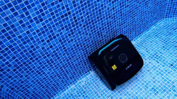 The Wybot C2 navigating our test pool floor