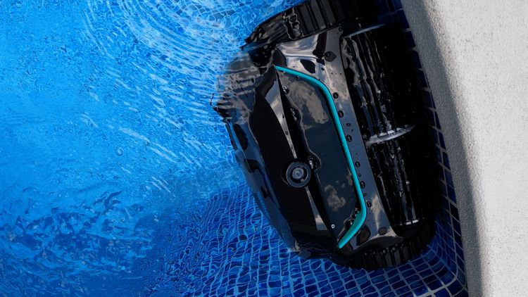 Wybot C2 attempting to clean the pool wall and waterline