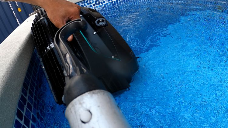 Pulling the Wybot C2 out of the pool — a daily ritual