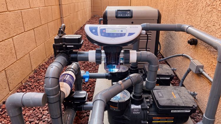 The E-CHLOR's all-in-one design installed on an equipment pad — controls and clear cell in one compact unit, no wall-mounted box