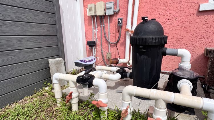 A salt chlorine generator is one more piece of equipment on your pad — a control unit driving an inline cell