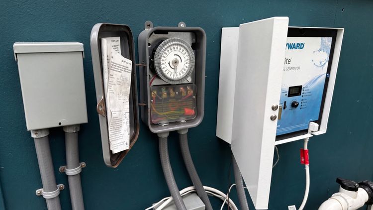 The power center mounts on the wall next to your pump timer so the cell only fires when water is moving