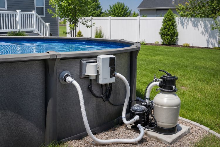 Above-ground salt systems mount right at the pool wall and connect through the return jet — no hard plumbing required