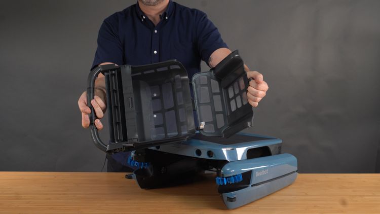 The filter basket is side loading and unlatches to be cleaned